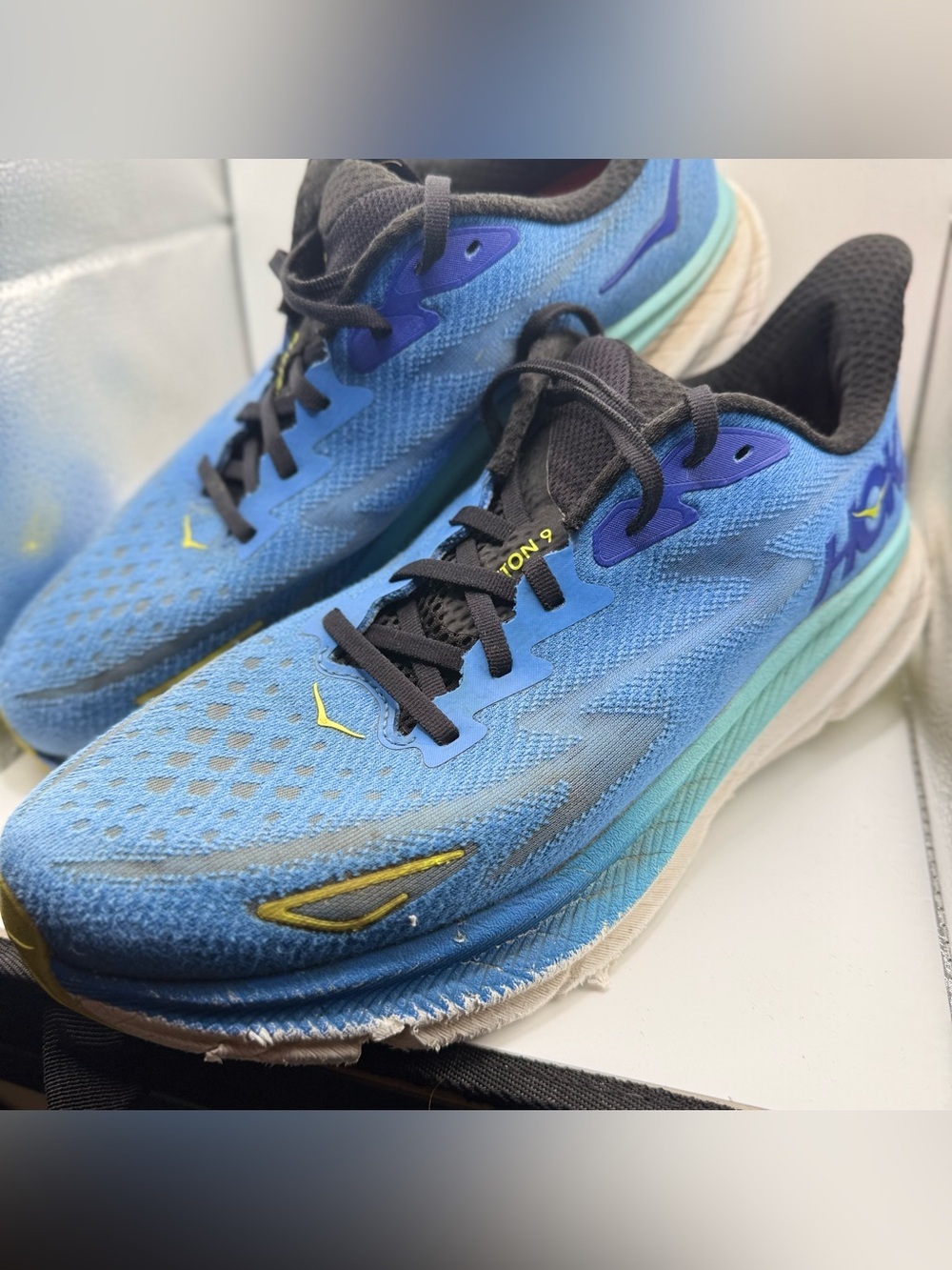 Hoka Men's Blue and Black Running Shoes with Yellow Accents